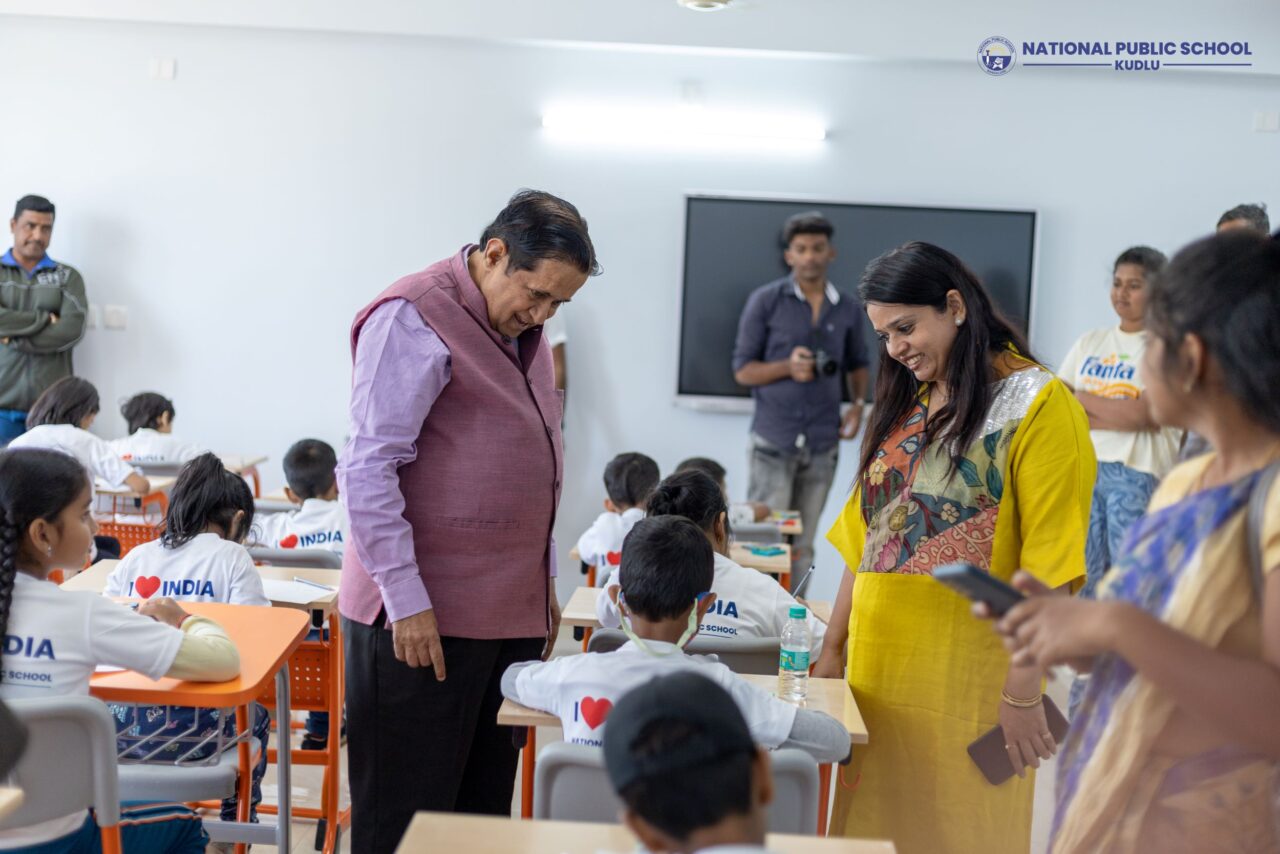 Mr Sundariah Shadakshari & Ms Aruna Shadakshari is interacting with the kids who participated in the drawing competition on Walkathon Event at National Public School Kudlu