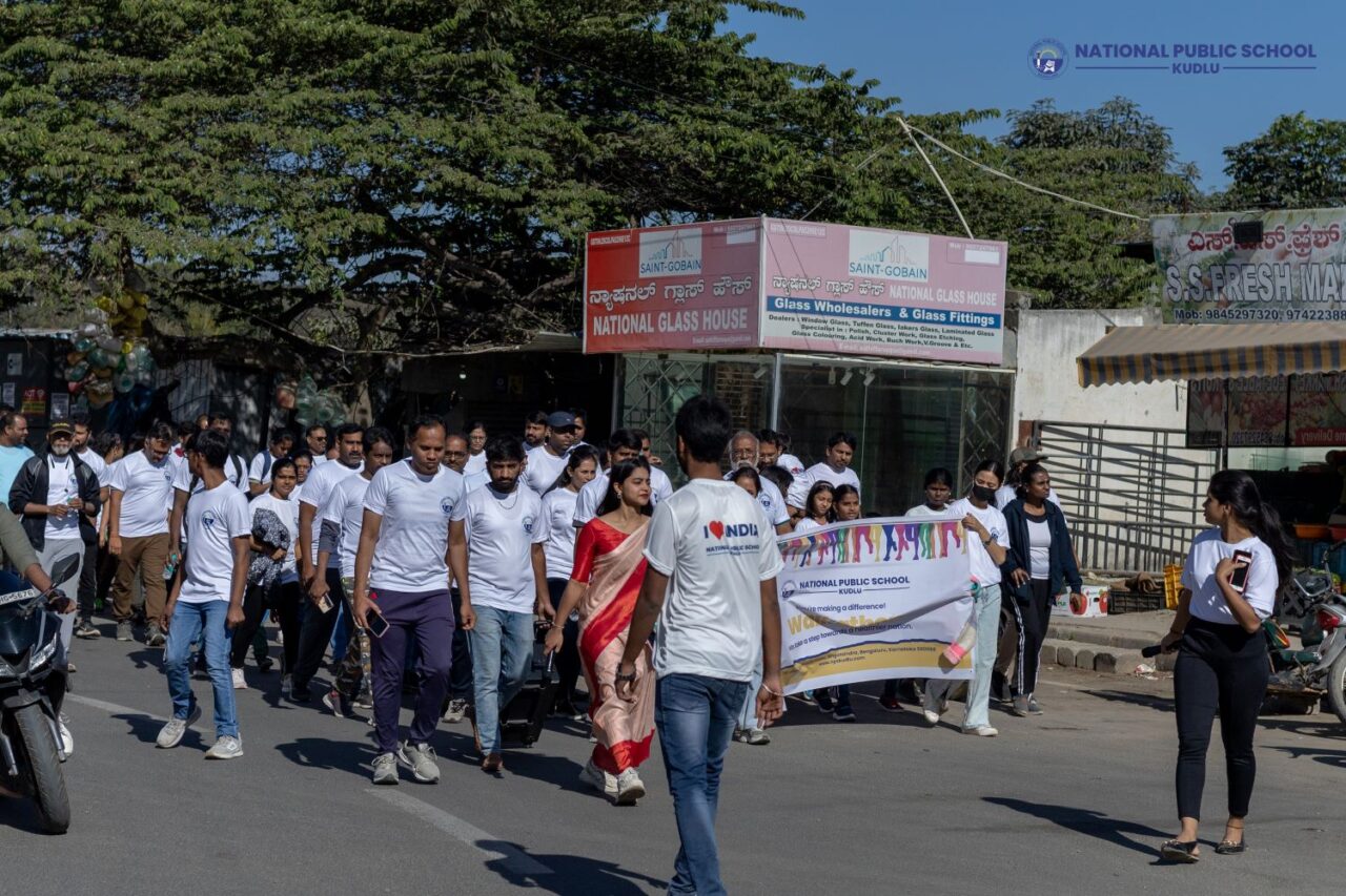 The crowd is marching towards the NPS kudlu campus on the Walkathon event which was organised for Republic Day by National Public School Kudlu.
