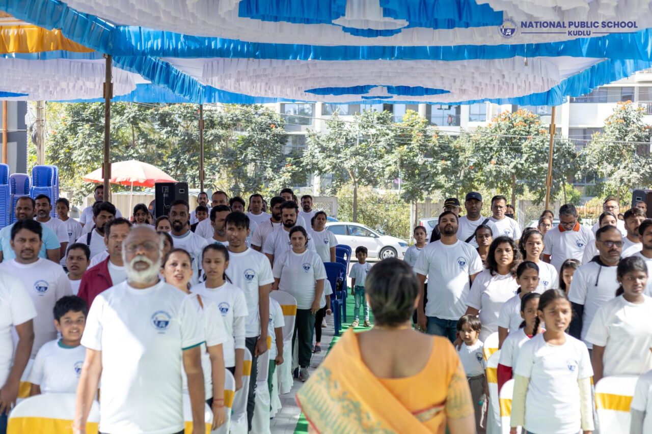 The participants of walkathon have stood and singing National Anthem Jana Gana Mana with all pride and happiness during walkathon event at national public school kudlu
